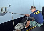 Thumbnail for File:US Navy 111018-N-UD469-023 Navy Diver 1st Class Brody Kraft, assigned to Southwest Region Maintenance Center at Naval Air Station North Island, pul.jpg