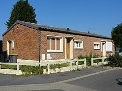 Des habitations post-Nationalisation groupées par deux.