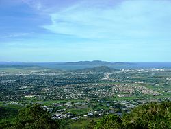 Part of Lavarack Barracks in the foreground, viewed from Mount Stuart, with Townsville CBD, Castle Hill and Magnetic Island in the distance View of Townsville from Mt Stuart.jpg