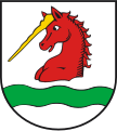 Gemeinde Opfenbach In Silber über grünem Wellenbalken der Rumpf eines goldgehörnten roten Einhorns.