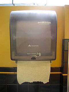 Paper-towel dispenser a device most commonly located in public bathrooms used to dispense paper towels in small quantities when triggered appropriately with the pushing of a lever or a sensor that detects hand motion; this device is usually located near the bathroom sink.