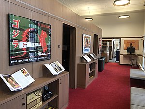The main space at the Yale Film Archive, including viewing booths, film posters, books, and equipment.