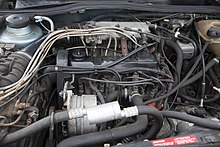 An 85 hp 1.8-liter GX engine mounted in a 1985 Volkswagen Golf II 1985 VW Golf engine (GX), Hershey 2019.jpg