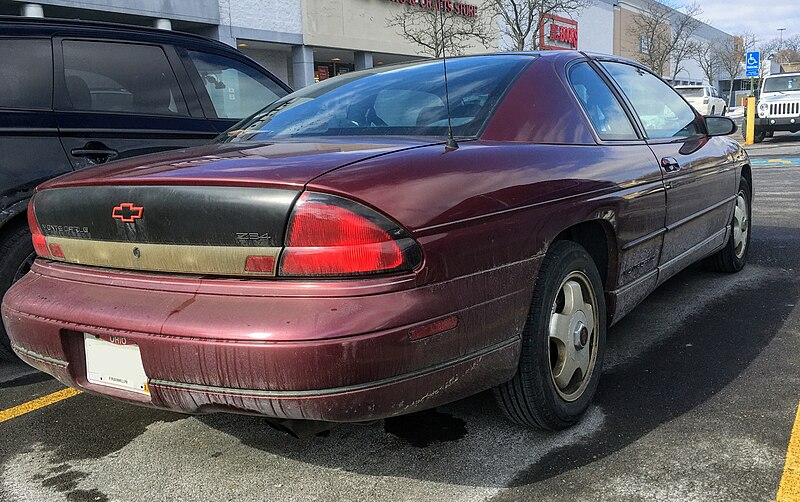 File:1998 Chevrolet Monte Carlo Z34 in Dark Carmine Red Metallic, rear right, 2-7-2021.jpg