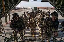 US paratroopers of 2nd Battalion, 503rd Infantry Regiment depart Italy's Aviano Air Base for Latvia, 23 February 2022. Thousands of US troops were deployed to Eastern Europe amid Russia's military build-up. 2nd Battalion, 503rd Infantry Regiment, 173rd Airborne Brigade depart Aviano Air Base, Italy, Feb. 24, 2022.jpg