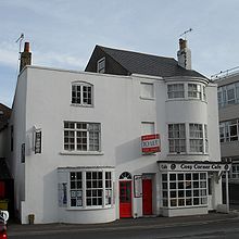 40/40A (right) and 42 (left) High Street are early-19th-century survivors on the High Street in central Worthing. 40 High Street is the oldest building in the town centre 42 and 40 High Street, Worthing (IoE Codes 432603 and 432602).jpg