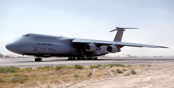 436th Operations Group Lockheed C-5B Galaxy, 87-033 "Spirit of the Tuskegee Airmen", waits for clearance to taxi out on the parking ramp at Balad Air 