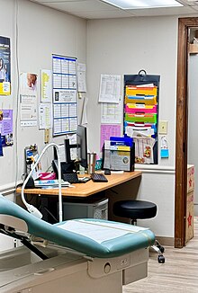 An exam room at a local community public health department in the United States. An exam room at a local community public health department in the United States.jpg