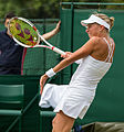 Andrea Hlaváčková competing in the first round of the 2015 Wimbledon Qualifying Tournament at the Bank of England Sports Grounds in Roehampton, England. The winners of three rounds of competition qualify for the main draw of Wimbledon the following week.