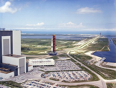 Saturn V SA-506, the rocket carrying the Apollo 11 spacecraft, moves out of the Vehicle Assembly Building towards Launch Complex 39