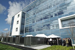 Several fuel cells installed outside of a large office building