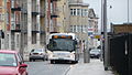 English: Bluestar 2007 (HF58 HTO), a Scania OmniCity, in High Street, Southampton, Hampshire, seen unusually on Uni-link route U1A. Route U1 has always been run with double-deckers since Bluestar took over the Uni-link contract, but a recent frequency increase and vehicle maintenance meant single-deckers were appearing on the route occasionally around the time of this photo.