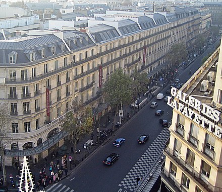 Mansard rooftops along Boulevard Haussmann in Paris constructed during the Second French Empire.