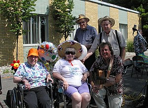 Bob and the Green Valley Boys pose with some residents after a concert in Battle Creek Michigan Bob and GV Boys at Mercy.jpg