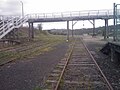 Bombala station looking north towards Cooma from the station. The footbridge is a bit decrepit but still safe to walk on. (The footbridge was fully restored in 2012 [24]).