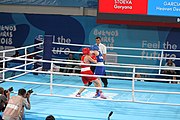 Deutsch: Boxen bei den Olympischen Jugendspielen 2018 Tag 12, 18. Oktober 2018 - Kampf um die Bronzemedaille im Fliegengewicht Mädchen – Heaven Destiny Garcia (USA, blau) schlägt Goryanana Stoeva (Bulgarien, rot) 5-0; Ringrichter ist Ishanguly Meretnyyazov (Turkmenistan). English: Boxing at the 2018 Summer Youth Olympics on 18 October 2018 – Girl's flyweight Bronze Medal Bout - Heaven Destiny Garcia (USA, blue) beats Goryanana Stoeva (Bulgaria, red) 5-0; Referee is Ishanguly Meretnyyazov (Turkmenistan). Español: Boxeo en los Juegos Olímpicos Juveniles de Verano de 2018 en 18 de octubre de 2018 - Combate a medalla de bronce de peso mosca para mujeres: Heaven Destiny Garcia (Estados Unidos, azul) le gana a Goryanana Stoeva (Bulgaria, roja) 5-0; El árbitro es Ishanguly Meretnyyazov (Turkmenistán).