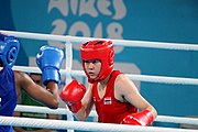 Deutsch: Boxen bei den Olympischen Jugendspielen 2018 Tag 12, 18. Oktober 2018 - Finale Leichtgewicht Mädchen – Junioren-Weltmeisterin und dreifache Juniorinnen-Europameisterin Caroline Sara DuBois (Großbritannien, blau) schlägt Juniorinnen-Asienmeisterin Porntip Buapa (Thailand, rot). English: Boxing at the 2018 Summer Youth Olympics on 18 October 2018 – Girls' lightweight Gold Medal Bout – Caroline Sara DuBois (Grat Britain, blue) wins over Porntip Buapa (Thailand, red). Español: Boxeo en los Juegos Olímpicos Juveniles de Verano de 2018 en 18 de octubre de 2018 - Combate de medalla de oro de peso ligero para niñas - Caroline Sara DuBois (Gran Bretaña, azul ) gana sobre Porntip Buapa (Tailandia, rojo).