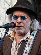 Country musician Buddy Miller produced the song. Buddy-Miller in 2010.jpg