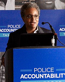 Task Force chair Lori Lightfoot unveils the report Chicago Police Accountability Task Force Press Event for the Release of its Report (26889469694) (cropped2).jpg