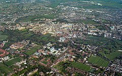 The Backs appear as the horizontal green band in the middle left of this aerial photograph of Cambridge. Cmglee Cambridge aerial.jpg