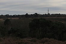 Corfe Hills seen from Barrow Hill. The highest point is near the foot of the transmission mast. Corfe Hills from Barrow Hill 1.JPG