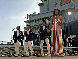 Gladys Knight & The Pips perform aboard the aircraft carrier USS Ranger on November 1, 1981. Left to right: William Guest, Edward Patten, Merald "Bubba" Knight, and Gladys Knight.