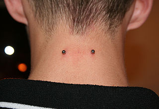 <span class="mw-page-title-main">Nape piercing</span> Piercing through the back of the neck