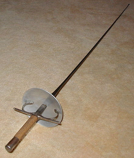 A foil fitted with an Italian grip. The Italian grip is still in use as the initial teaching weapon in Italy and many other countries that follow the Italian pedagogical tradition. While still in use with many classical fencers, most competitive sport fencers have abandoned the Italian grip in favor of variations of the pistol grip, with the French grip used rarely. The French grip is easier to learn, but the pistol grip gives a wider range of handling. As of March 2019, the Italian grip remains legal for use in modern competition.[10]