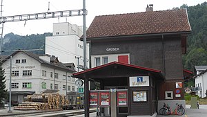 Two-story building with gabled roof