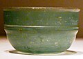 Image 74A green Roman glass cup unearthed from an Eastern Han Dynasty (25–220 AD) tomb in Guangxi, southern China; the earliest Roman glassware found in China was discovered in a Western Han tomb in Guangzhou, dated to the early 1st century BC, and ostensibly came via the maritime route through the South China Sea (from Roman Empire)