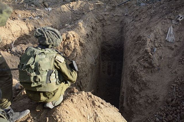 IDF soldier overlooking an uncovered tunnel in the Gaza Strip during Protective Edge