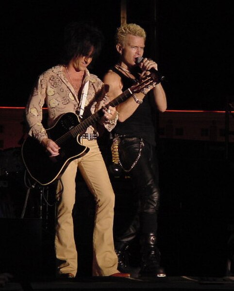 Stevens (left) and Billy Idol in 2003