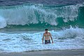 Ilha Grande, Brazil - Phil emerging from the surf - (24843640675).jpg