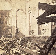 The interior of the church after the fire in 1865 Interior view of the North Side, with the Chancel, from the N.W. cor. of South Tower, from Robert N. Dennis collection of stereoscopic views crop.jpg