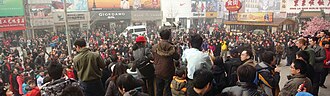 Crowd in front of a McDonald's in Wangfujing on the 2011 Chinese pro-democracy protests Jasmine Revolution in China - Beijing 11 02 20 crowd.jpg