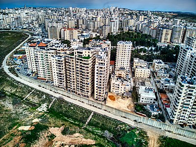 Kafr 'Aqab neighborhood near the Jerusalem International Airport and the Israeli West Bank barrier