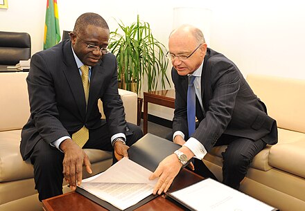 Kodjo Menan (left) with Hector Timerman Kodjo Menan with Timermann.jpg