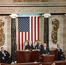 Hayden seated to the left of John W. McCormick during a 1963 speech by President Lyndon B. Johnson to a joint session of Congress