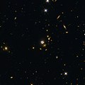 Another lensed quasar, HE0435-1223 in Eridanus, and its surroundings.[8]