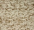 A 24.66 inches (626 mm)-wide fabric swatch of MARPAT desert pattern