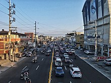 MacArthur Highway at Angeles, the neighboring city San Fernando is southbound of the highway. MacArthur Highway Angeles City, Pampanga.jpg