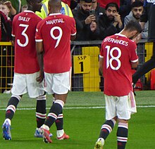 [[Eric_Bailly]] e [[Bruno Fernandes]] com o jogador.