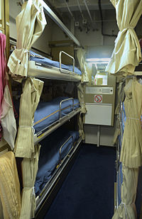 A berth on a Royal Navy vessel Messdeck Accommodation MOD 45154791.jpg