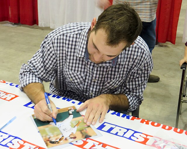 Wacha signing autographs in January 2014