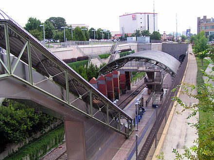 Mockingbird Station, the light rail platforms are in the foreground, the mall and parking in the background Mockingbird Station 1.jpg