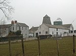 Mouswald Grange Bývalá věž větrného mlýna, blok pece a severovýchodní oblast Steading (bývalá sýpka)