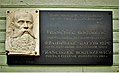 Memorial plaque of on a library in Savičiūnai, Vilnius district, Lithuania.