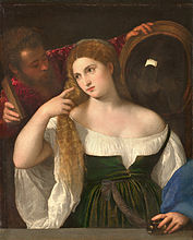 Mulher na frente de um espelho.  OK.  1515. Óleo sobre tela.  Louvre, Paris