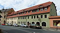 Two houses, No. 8 free-standing to the right, No. 10 in a closed development, form a unit