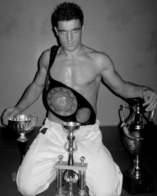 Rati Tsiteladze with World Champion's belt and other awards obtained in 2008